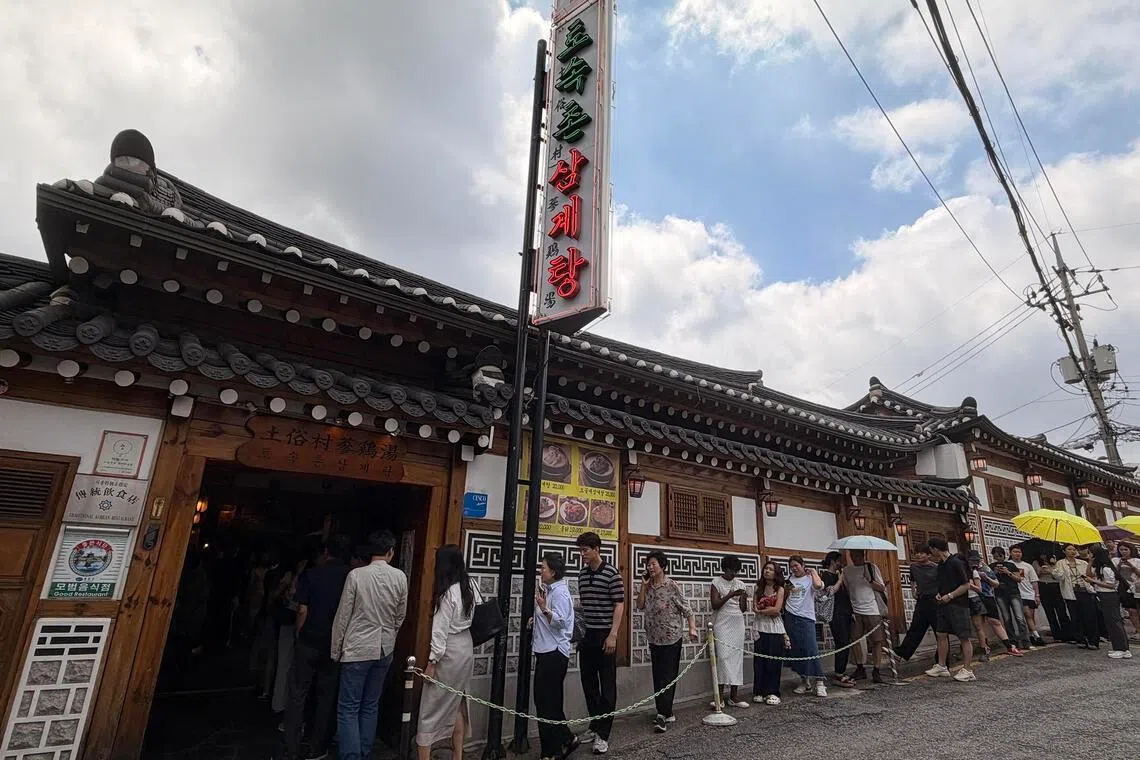 What inflation? South Koreans continue to queue for ginseng chicken soup in peak summer
