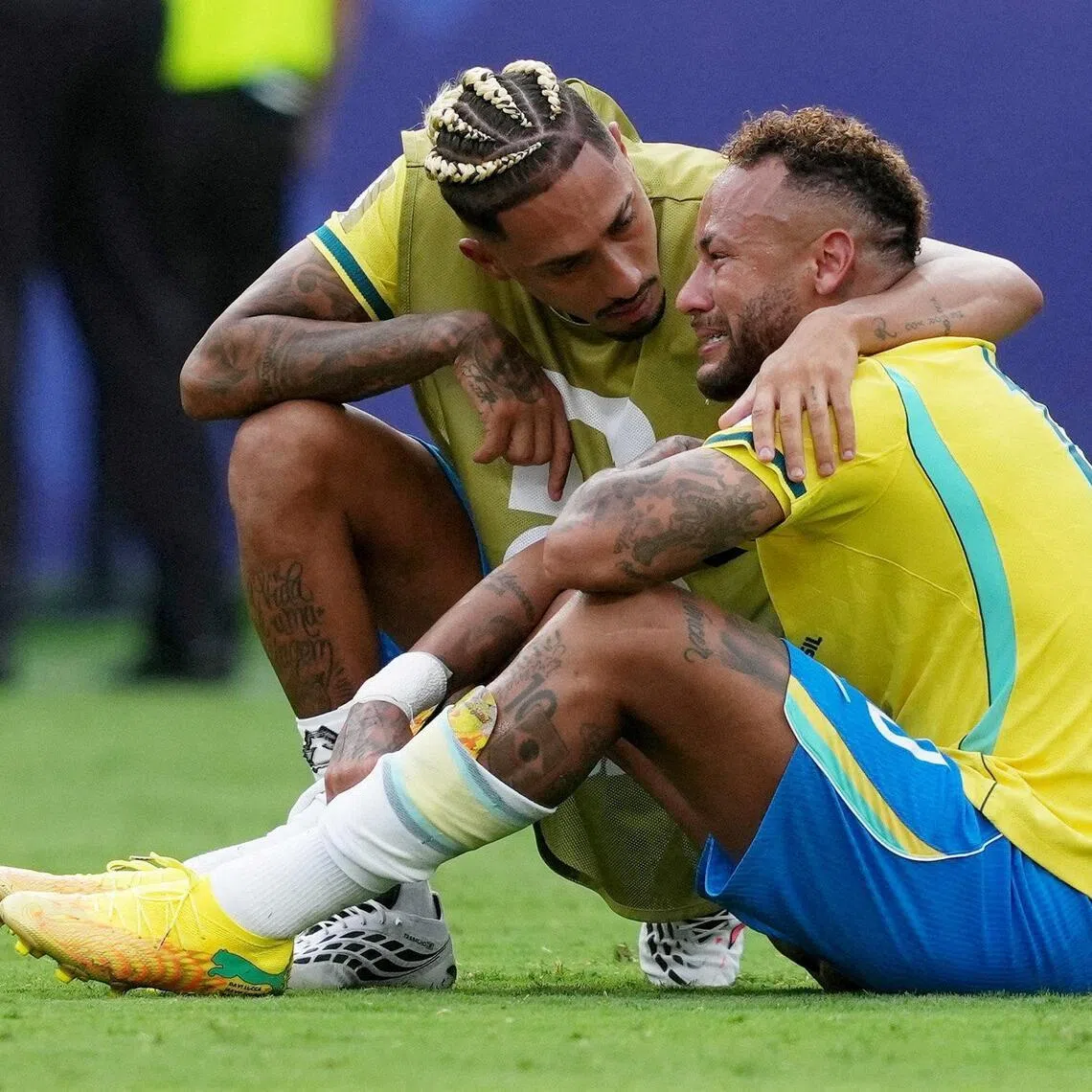 Brazil’s Raphinha comforts a tearful Neymar after Brazil are eliminated from the World Cup.