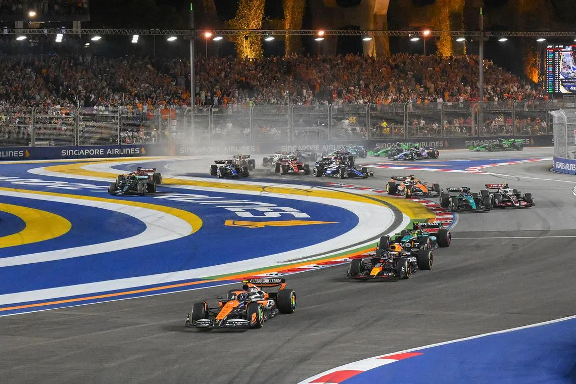 Lando Norris leading the pack during the Singapore Airlines Singapore Grand Prix on Sept 22, 2024.