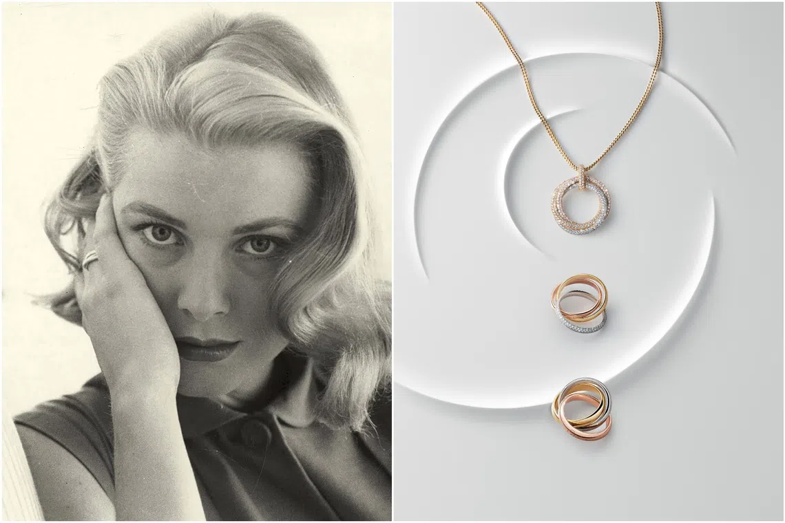 Beloved by Old Hollywood icons, the three-band Trinity turns 100 in 2024. American actress Grace Kelly photographed by Howell Conant in 1955 wearing the Trinity ring.