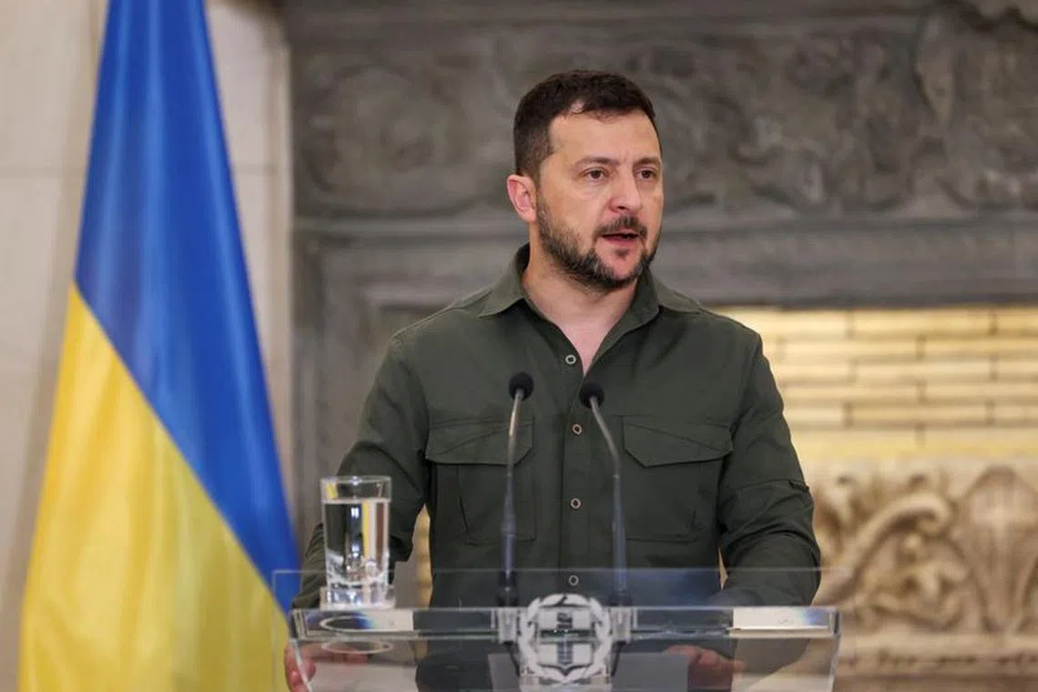 FILE PHOTO: Ukrainian President Volodymyr Zelenskiy speaks during a joint press statement with Greek Prime Minister Kyriakos Mitsotakis, as they meet at the Maximos Mansion in Athens, Greece, August 21, 2023. REUTERS/Stelios Misinas