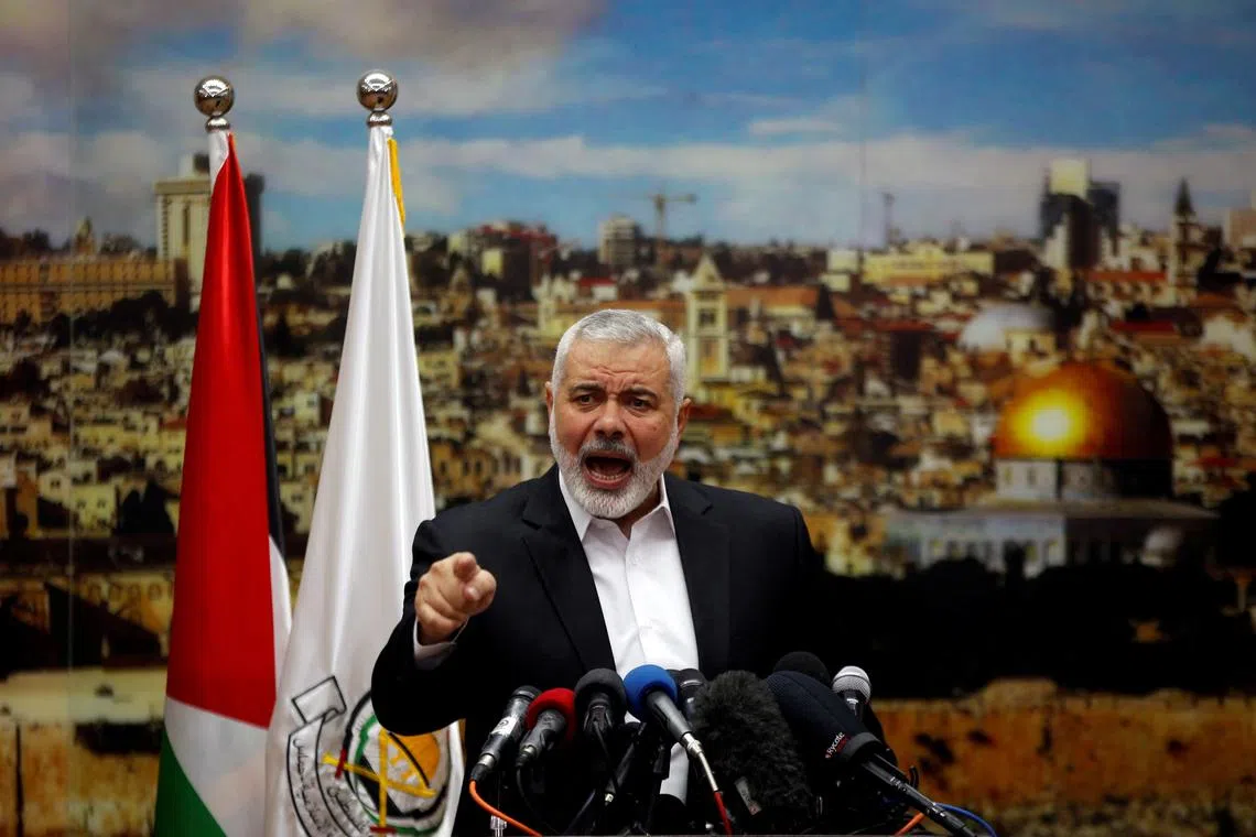 FILE PHOTO: Hamas Chief Ismail Haniyeh gestures as he delivers a speech over U.S. President Donald Trump's decision to recognize Jerusalem as the capital of Israel, in Gaza City December 7, 2017. REUTERS/Mohammed Salem/File Photo