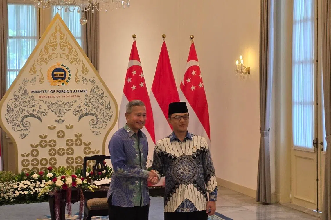 Singapore's Foreign Minister Vivian Balakrishnan (left) in meeting his counterpart Indonesian Sugiono in Jakarta on May 12.