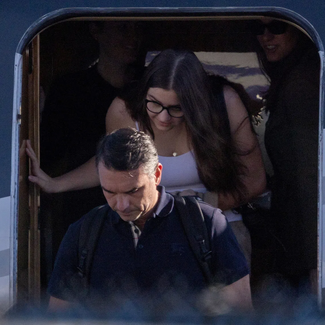 FILE PHOTO: Brazilian Senator Flavio Bolsonaro disembarks from a plane after arriving at Opa-locka Executive Airport near Miami, Florida, US, October 28, 2026. REUTERS/Eva Marie Uzcategui/File Photo