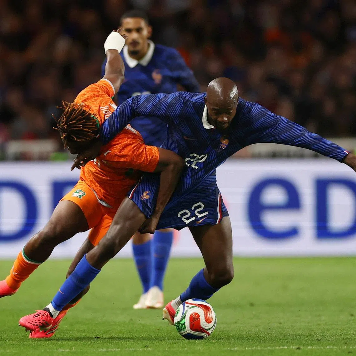 Soccer Football - International Friendly - France v Ivory Coast - The Stade de la Beaujoire - Louis Fonteneau, Nantes, France - June 4, 2026 France's Jean Philippe Mateta in action with Ivory Coast's Emmanuel Agbadou REUTERS/Gonzalo Fuentes