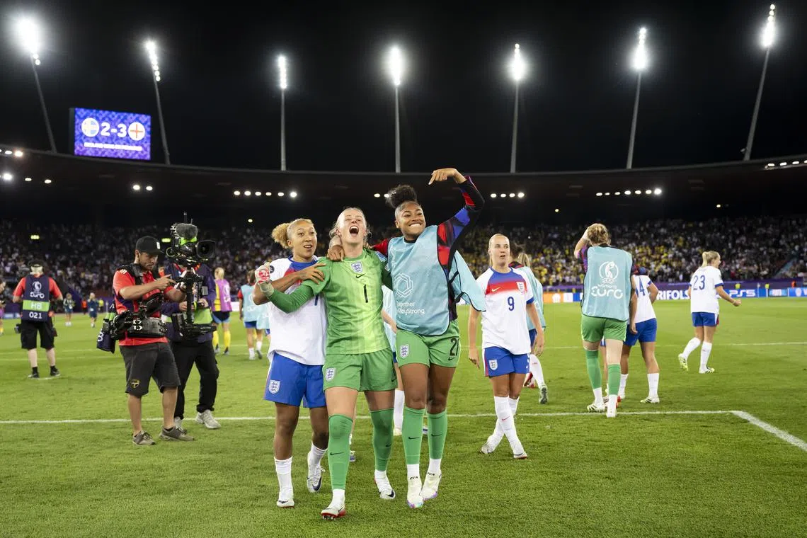 The England team celebrate after beating Sweden on penalties to reach the Women's Euro 2025 semi-finals.