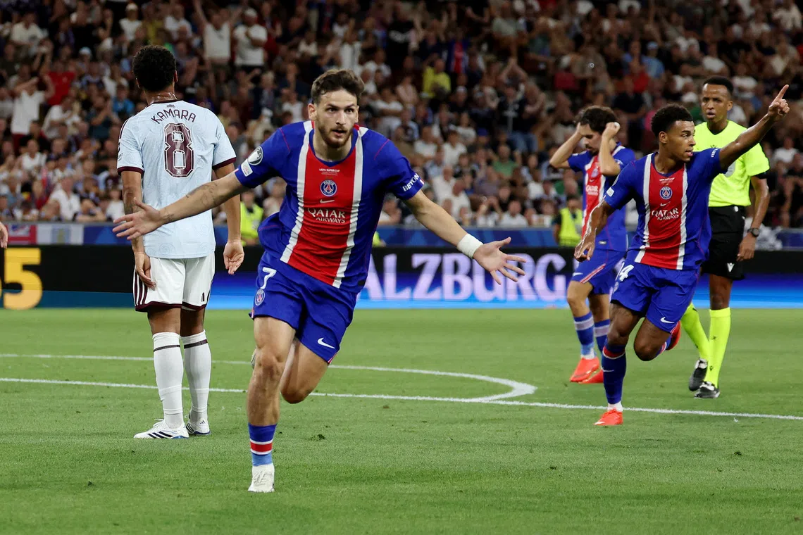 Soccer Football - UEFA Super Cup - Paris St Germain v Aston Villa - Stadion Salzburg, Salzburg, Austria - August 12, 2026 Paris St Germain's Khvicha Kvaratskhelia celebrates scoring their first goal REUTERS/Gintare Karpaviciute