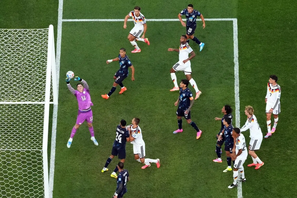 Paraguay’s Orlando Gill (in purple) in action on June 29.