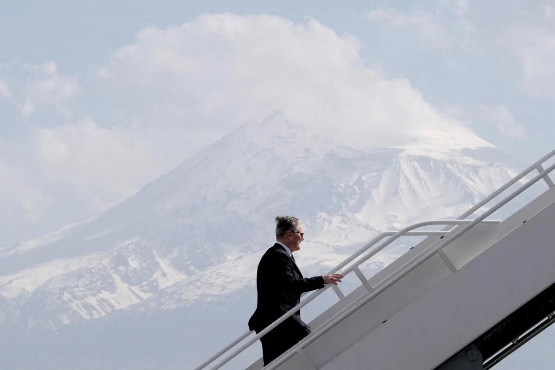 British Prime Minister Sir Keir Starmer boarding a plane following the European Political Community summit in Yerevan, Armenia, May 4.