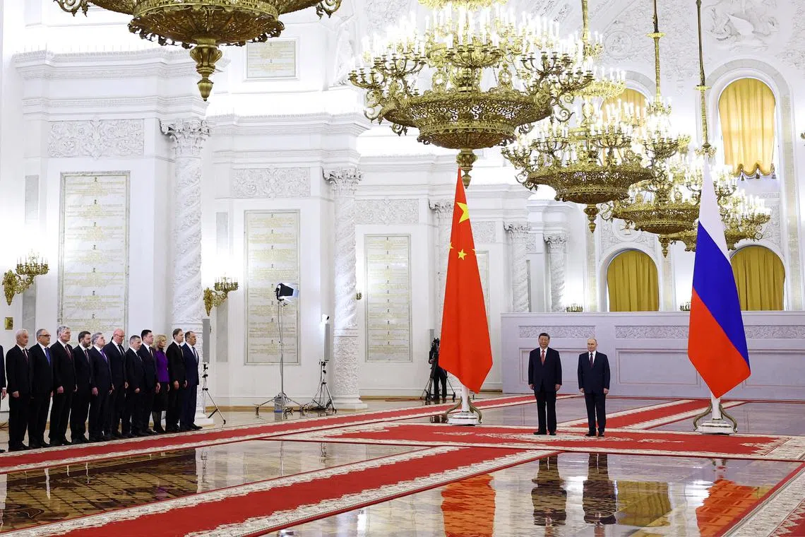 Members of the delegations, led by Russian President Vladimir Putin and Chinese President Xi Jinping, attend a welcoming ceremony before their talks at the Kremlin in Moscow, Russia, May 8, 2025. REUTERS/Evgenia Novozhenina/Pool