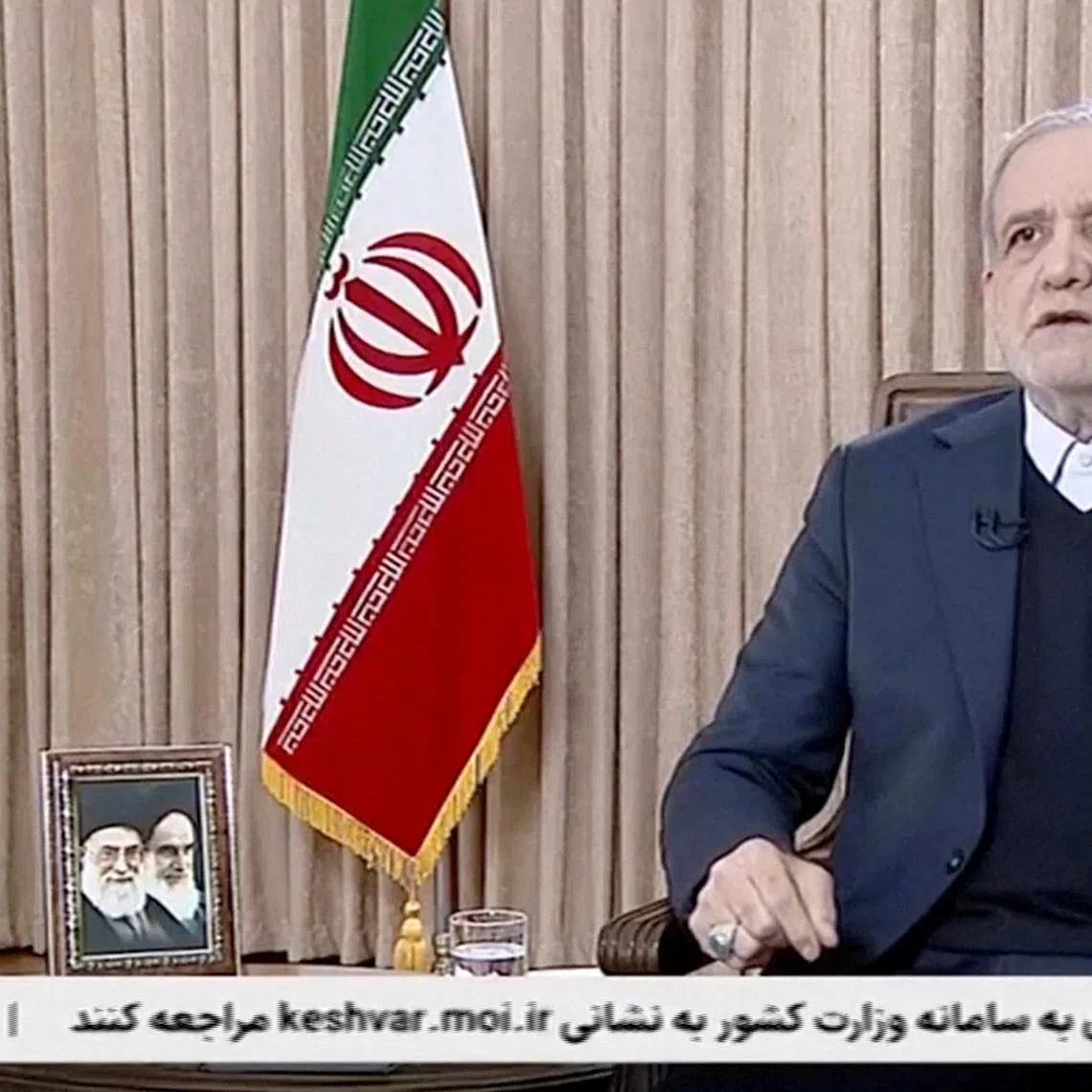 Iran's President Masoud Pezeshkian speaks during an interview with the state TV, amid protests, in Tehran, Iran in this screengrab obtained from a video released on January 11, 2026. IRIB/via Reuters TV/Handout via REUTERS