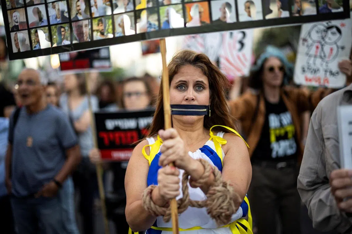 Protesters in Tel Aviv demand the immediate release of hostages kidnapped during Hamas' deadly Oct 7 attack on Israel.
