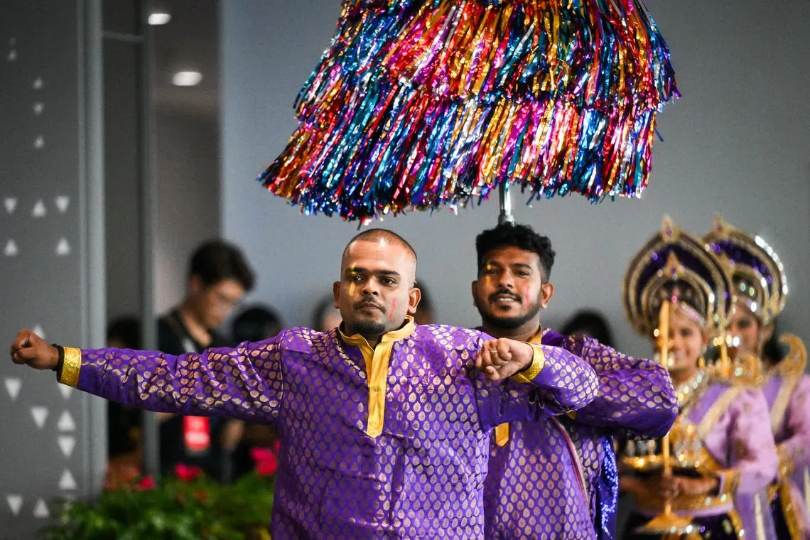 Migrant workers Manorenjinand and Subin Lal performing during the Chingay 2026 Media Preview and National Education Parade at the F1 Pit Building on Feb 7.
