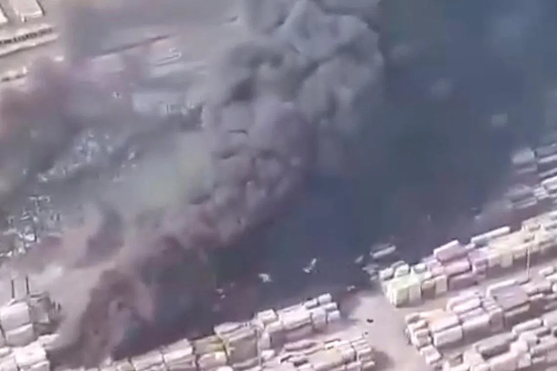 Helicopter aerial footage shows a fire burning at the site of a deadly port explosion, which also injured hundreds, in Bandar Abbas, Iran April 26, 2025 in this still image from social media video obtained by REUTERS  THIS IMAGE HAS BEEN SUPPLIED BY A THIRD PARTY. MANDATORY CREDIT. NO RESALES. NO ARCHIVES. NEWS USE ONLY.