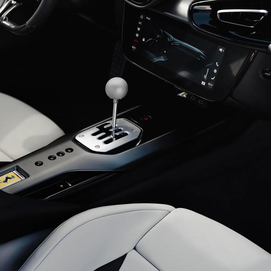 The Ferrari 12Cilindri Manuale has a dual-clutch transmission with a gear lever that mimics the conventional H-pattern gearbox.