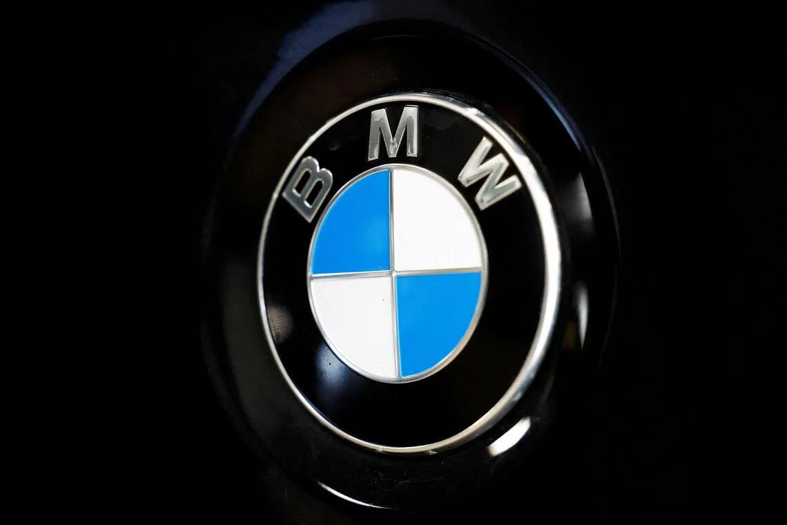 FILE PHOTO: A logo of BMW is seen inside a car dealer in Nijmegen, Netherlands February 26, 2025. REUTERS/Piroschka van de Wouw/File Photo