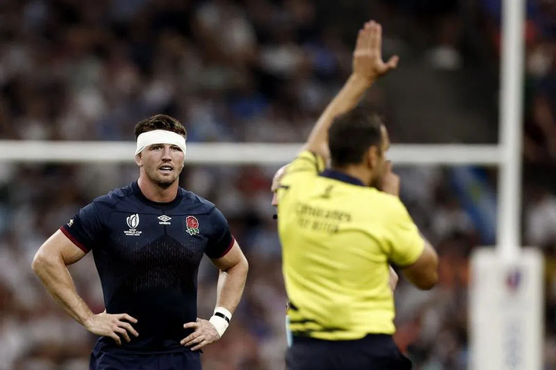 Rugby Union - Rugby World Cup 2023 - Pool D - England v Argentina - Orange Velodrome, Marseille, France - September 9, 2023 England's Tom Curry before being shown a yellow card by referee Mathieu Raynal REUTERS/Benoit Tessier/File photo