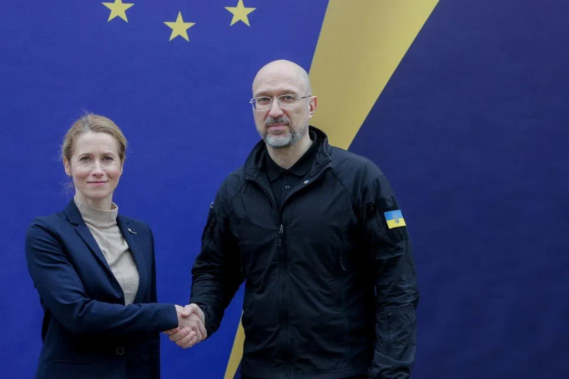 European Union High Representative for Foreign Affairs and Security Policy Kaja Kallas and Ukrainian Prime Minister Denys Shmyhal shake hands as they pose for a picture during a Ukraine-EU meeting, amid Russia's attack on Ukraine, in Lviv, Ukraine May 9, 2025. Press service of the Cabinet of Ministers of Ukraine/Handout via REUTERS