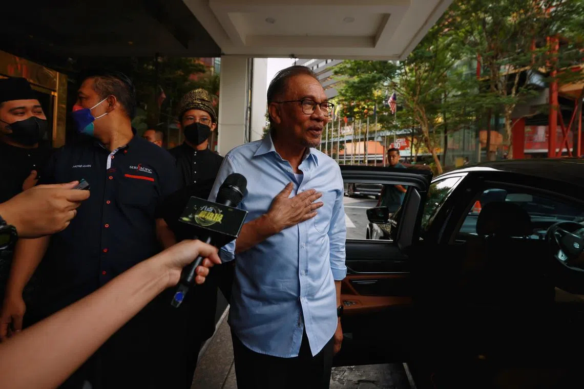 Pakatan Harapan chief Anwar Ibrahim arriving at the Seri Pacific Hotel in KL for a meeting with Barisan Nasional leaders, on Nov 21, 2022.