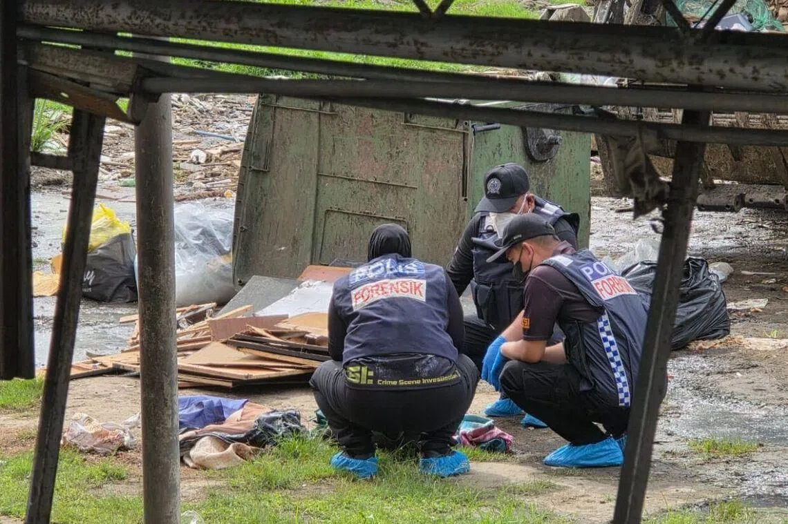 The woman’s dismembered body parts were found at two bin sites at Taman Indah Permai shophouses on Feb 12.