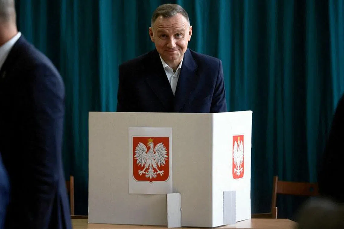 FILE PHOTO: Poland's President Andrzej Duda prepares to cast his ballot during the parliamentary election in Krakow, Poland, October 15, 2023. Jakub Porzycki/Agencja Wyborcza.pl via REUTERS/File Photo
