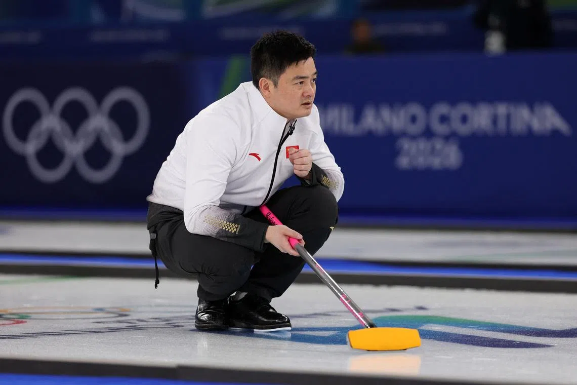 Milano Cortina 2026 Olympics - Curling - Men's Round Robin Session 9 - United States vs China - Cortina Curling Olympic Stadium, Cortina d'Ampezzo, Italy - February 17, 2026. Xu Xiaoming of China in action during the match against United States REUTERS/Issei Kato