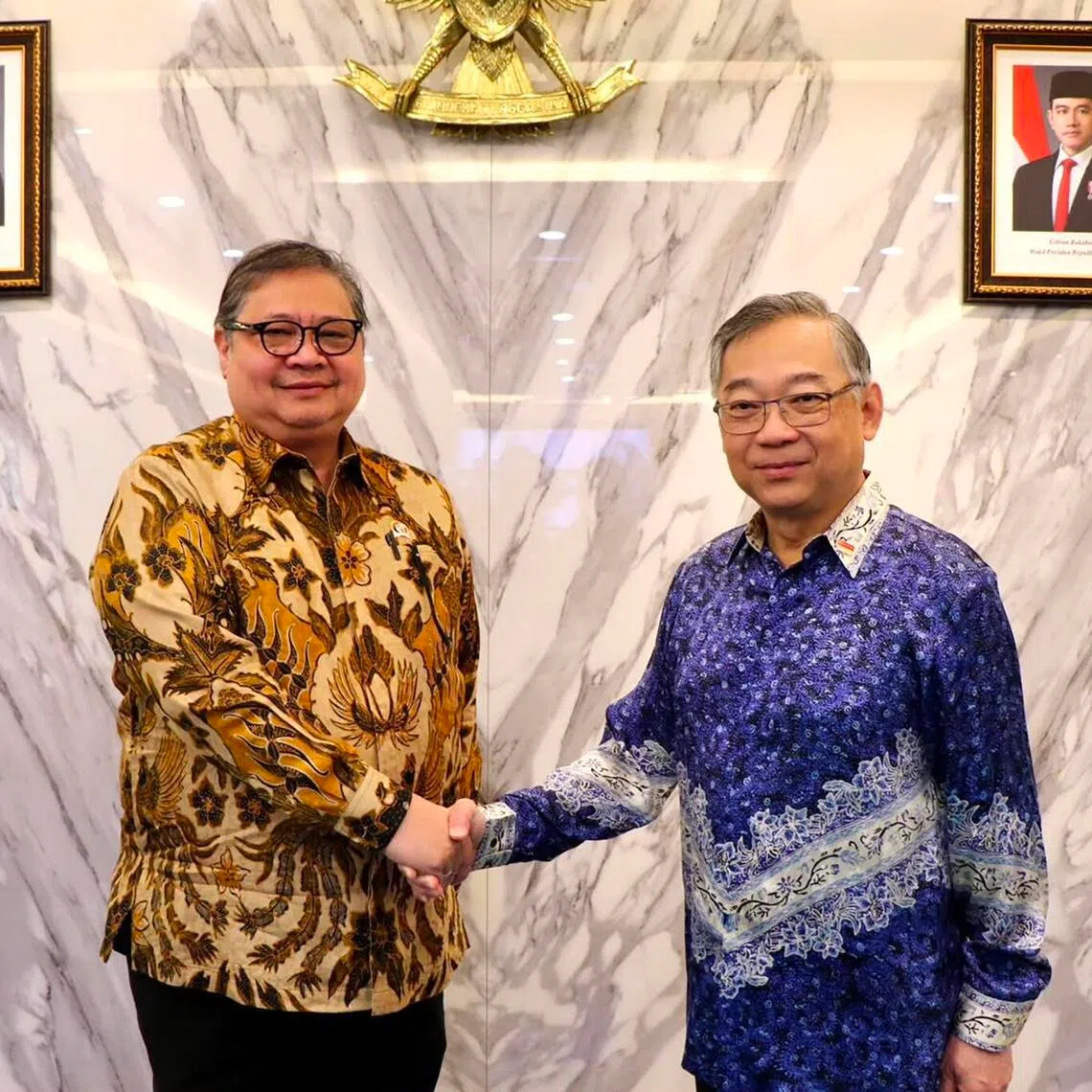 Singapore Deputy Prime Minister and Minister for Trade and Industry Gan Kim Yong (right) and Indonesian Coordinating Minister for Economic Affairs Airlangga Hartarto in Jakarta on June 9.