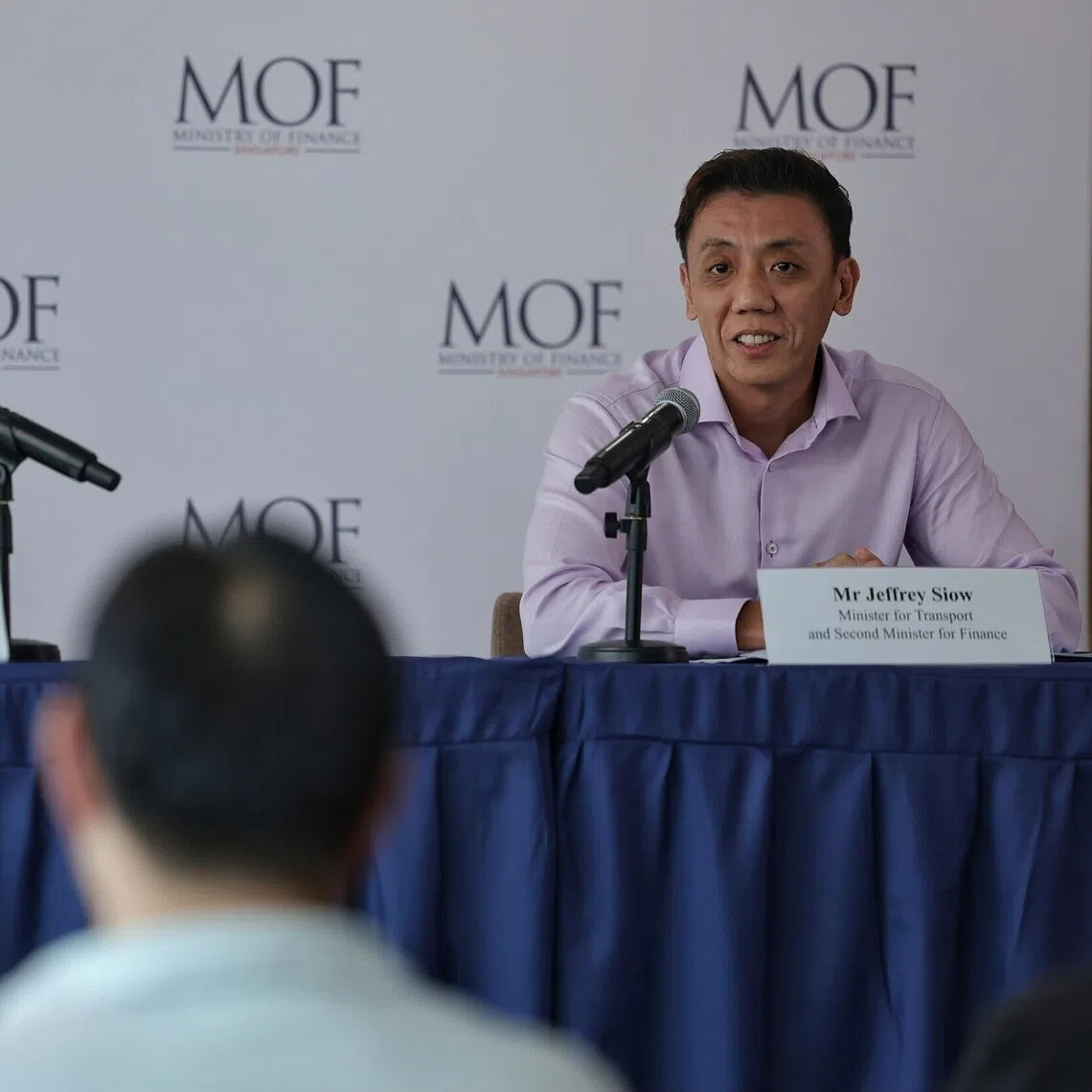 (From left) Senior Minister of State for Trade and Industry and Culture, Community and Youth Low Yen Ling and Transport Minister and Second Minister for Finance Jeffrey Siow at a press conference at The Treasury on July 29 to announce the second tranche of assistance measures in response to the Middle East situation.