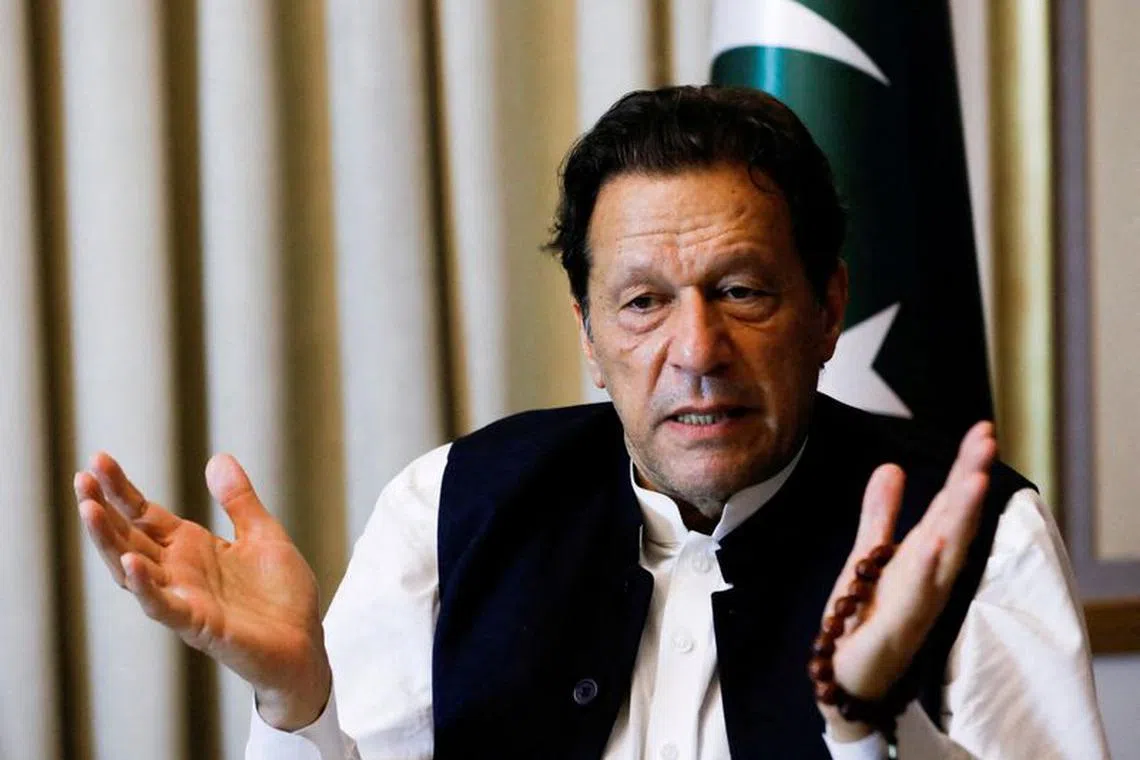 FILE PHOTO: Former Pakistani Prime Minister Imran Khan, gestures as he speaks with Reuters during an interview, in Lahore, Pakistan March 17, 2023. REUTERS/Akhtar Soomro/File Photo