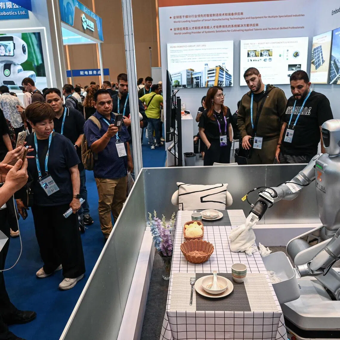 A robot from Huibo Robotics is pictured cleaning a desk at the Canton Fair, in Guangzhou , China, on April 15.