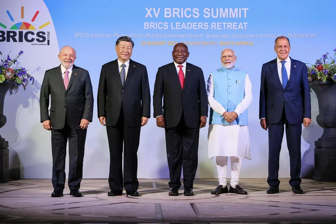 (From left) Brazil's President Luiz Inacio Lula da Silva, China's President Xi Jinping, South Africa's President Cyril Ramaphosa, India's Prime Minister Narendra Modi and Russia's Foreign Minister Sergei Lavrov.
