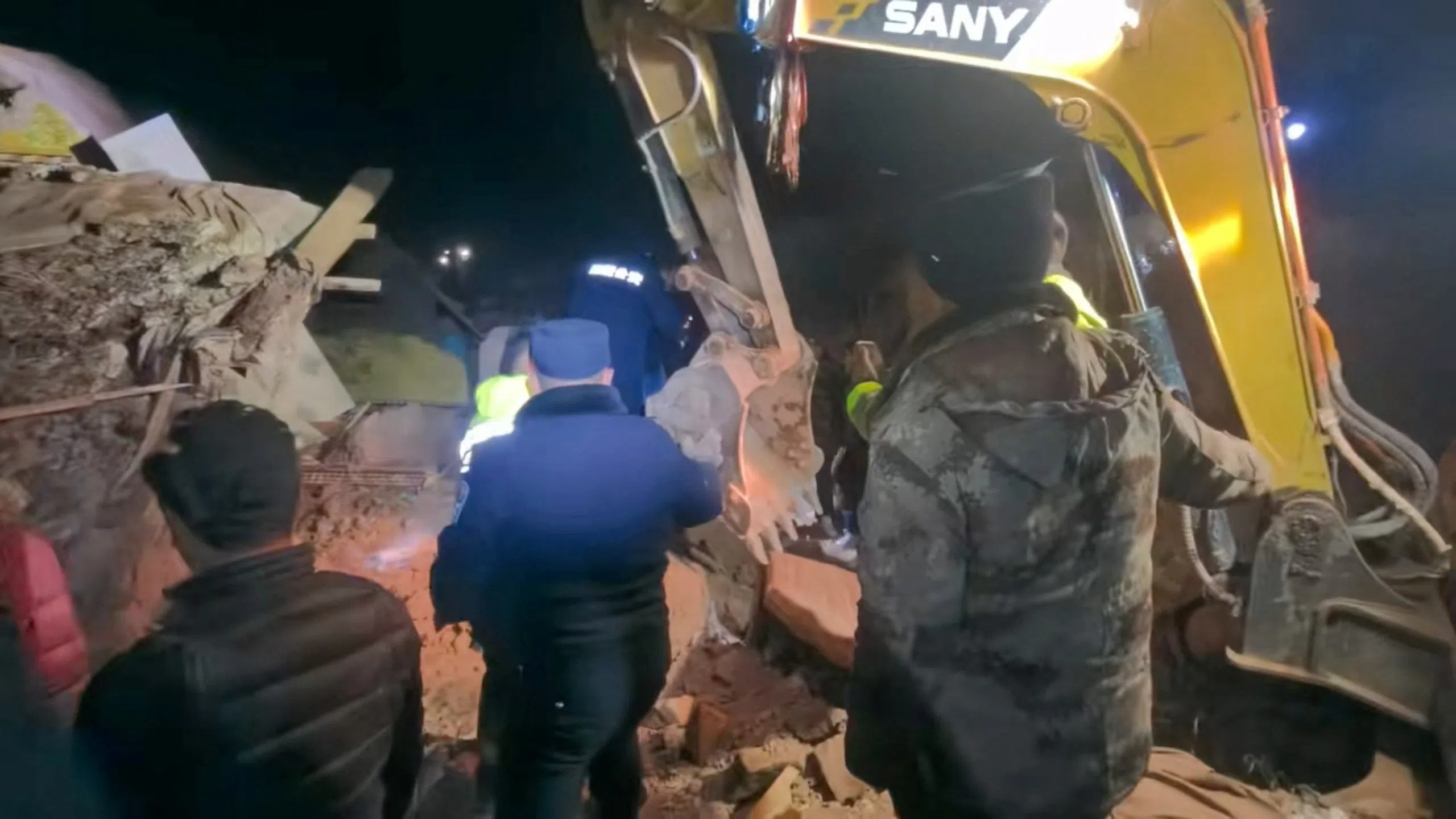 Emergency services personnel seen coordinating rescue efforts after the earthquake, at Nagqu, Tibet, China, in this still image from a video released Oct 23.