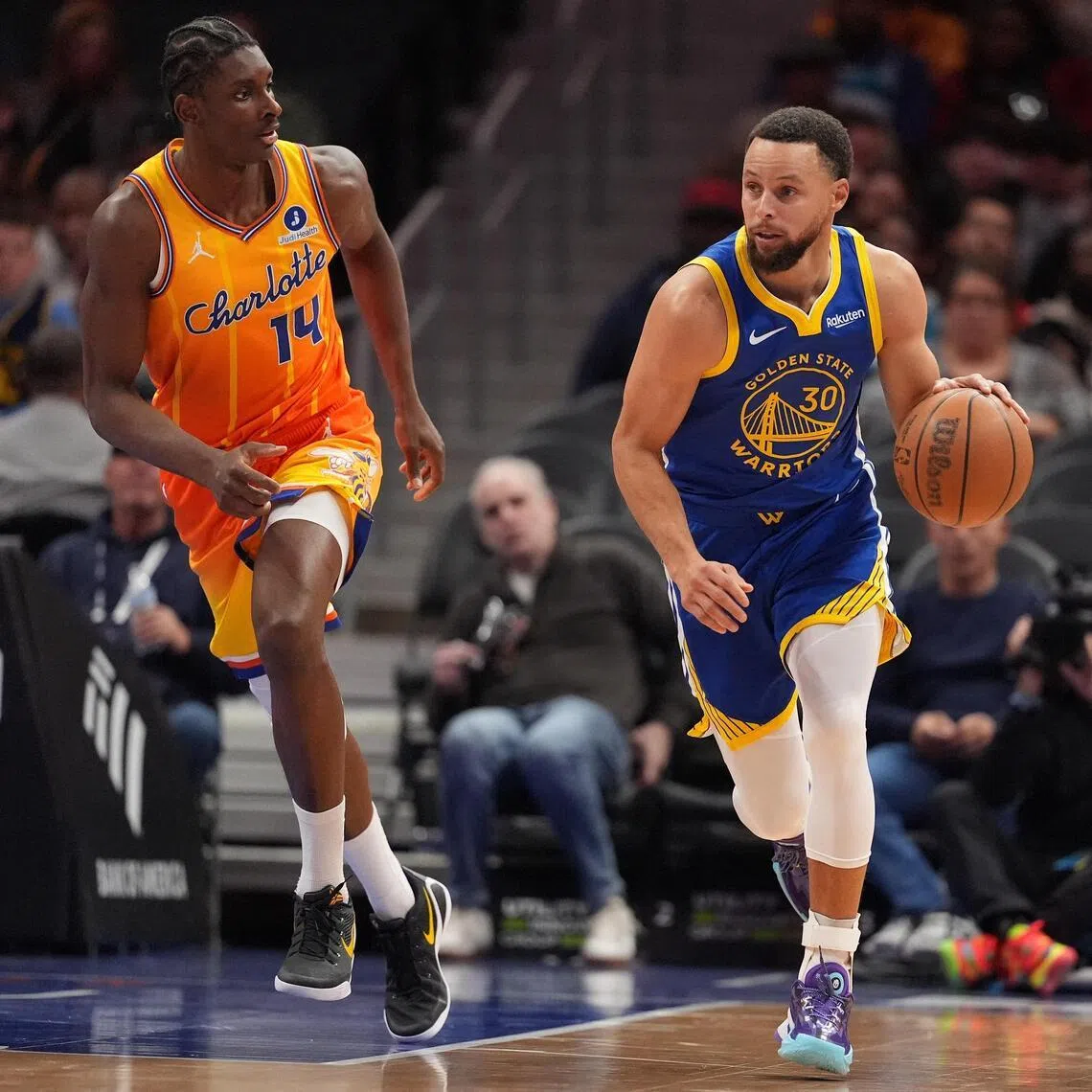 Golden State Warriors guard Stephen Curry bringing the ball up court during the Warriors' 132-125 NBA win at Spectrum Center on Dec 31, 2025.