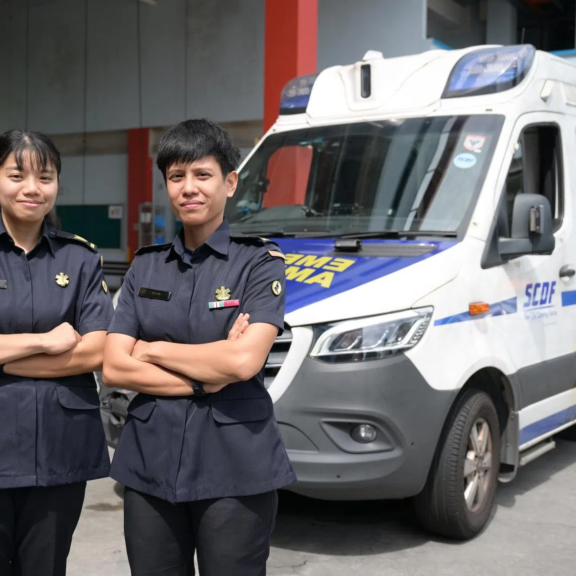 Paramedics SGT3 Sharon Tan, 26, and SGT3 Nur Ain, 32. 