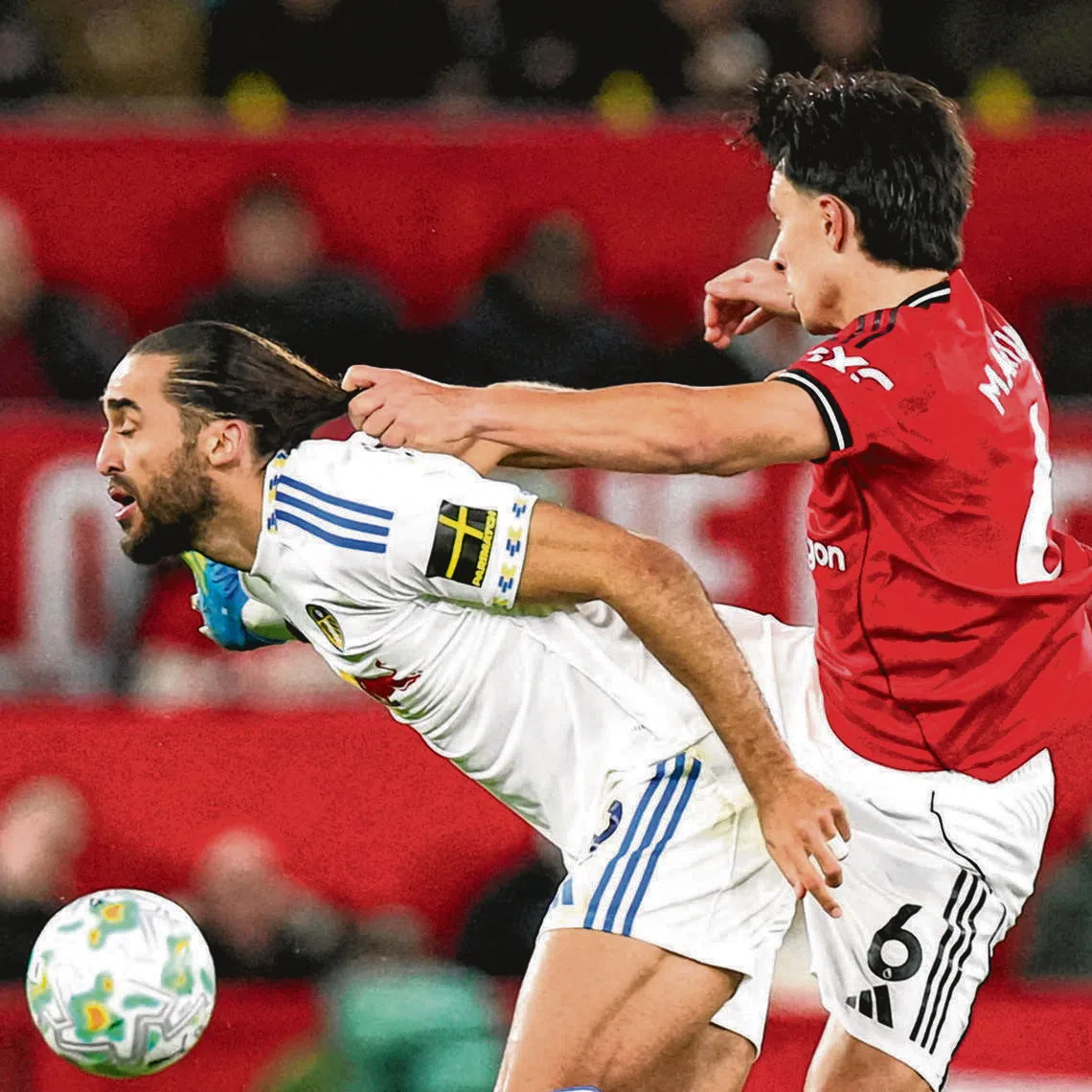 Manchester United’s Lisandro Martinez was shown a red card for pulling the hair of Leeds striker Dominic Calvert-Lewin.
