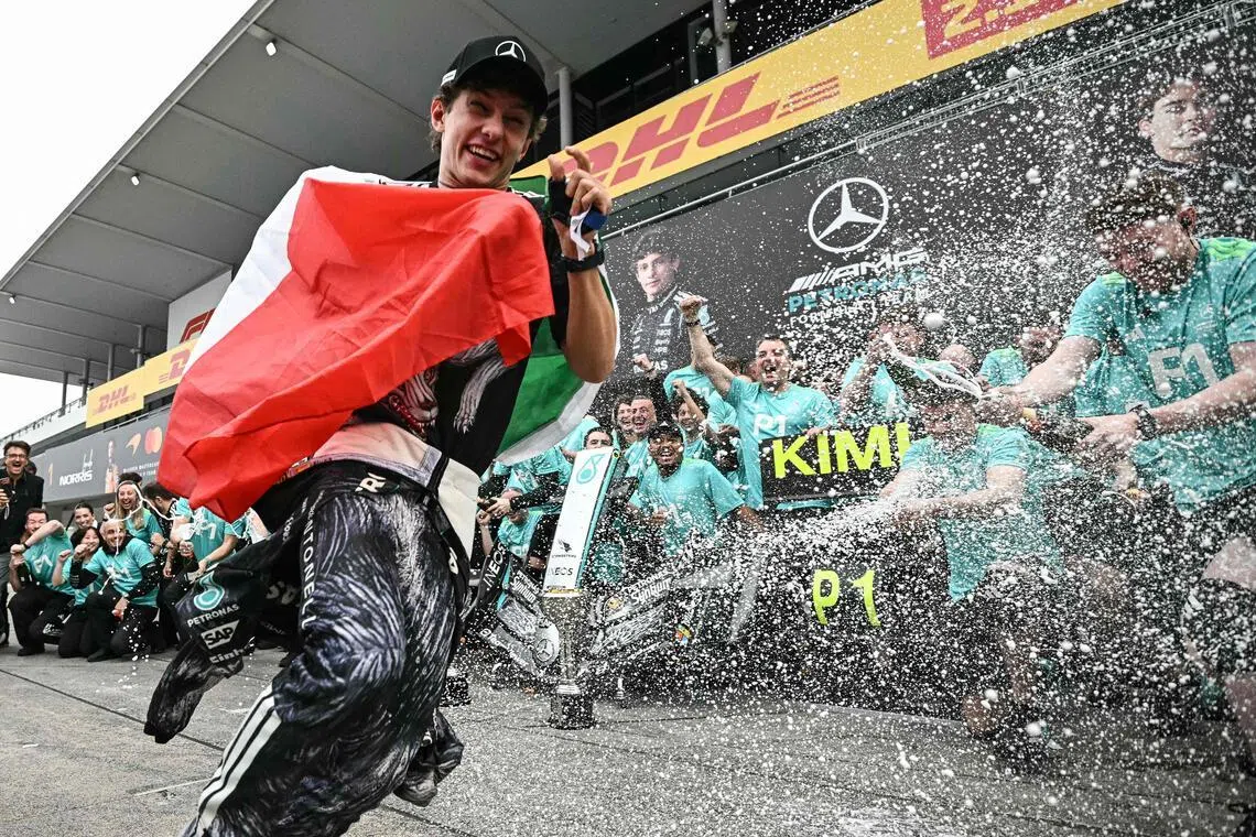 Mercedes' Kimi Antonelli celebrating his Japanese Grand Prix win at the Suzuka circuit on March 29.