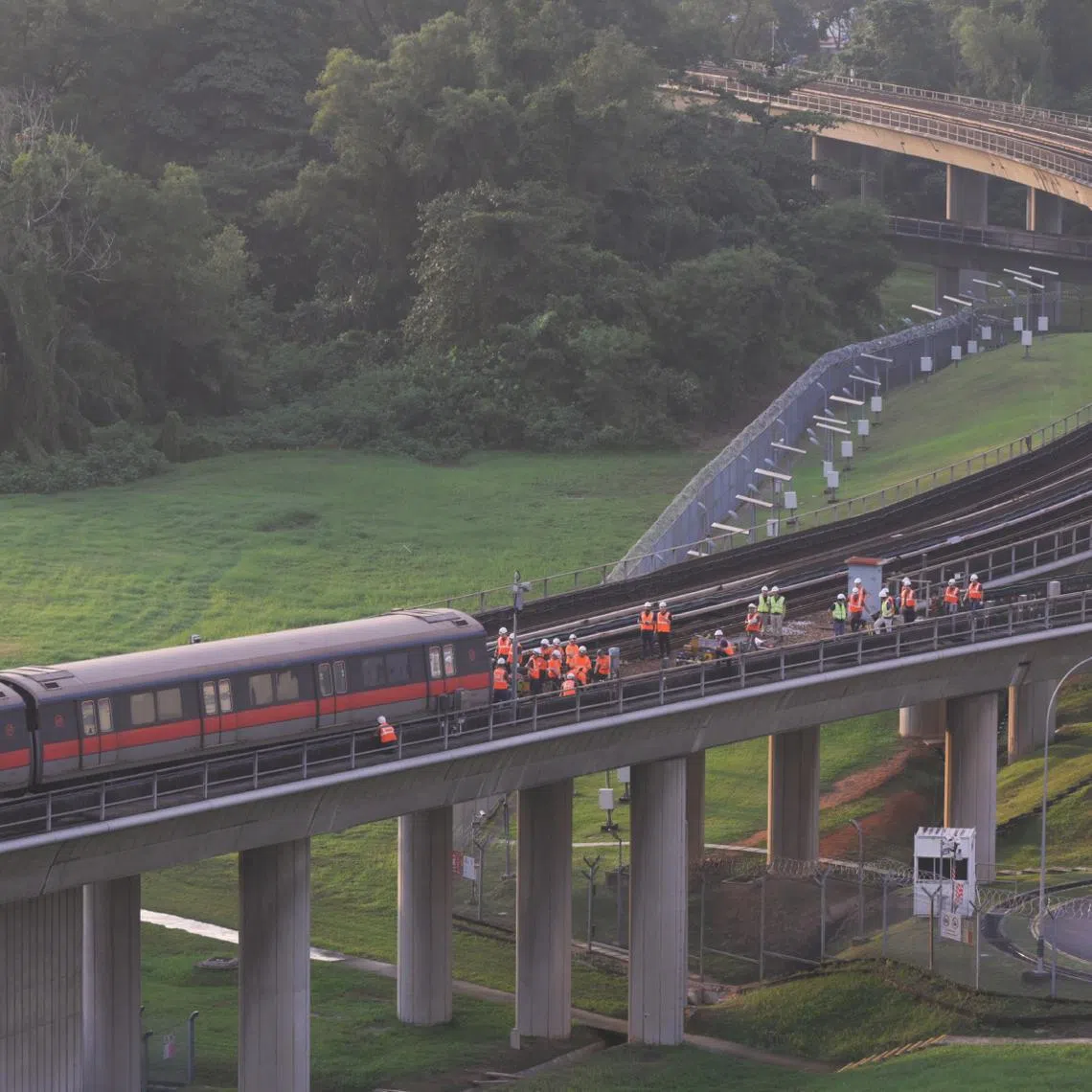 Work being done on the affected train and train track right outside Ulu Pandan Depot at around 6.30pm on Sept 25, 2024.
