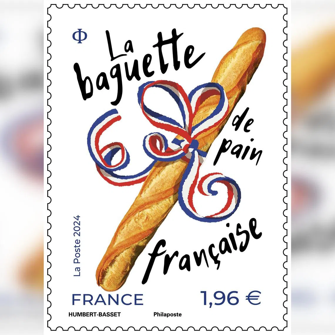 The stamp depicts a baguette decorated with a blue-white-red ribbon.