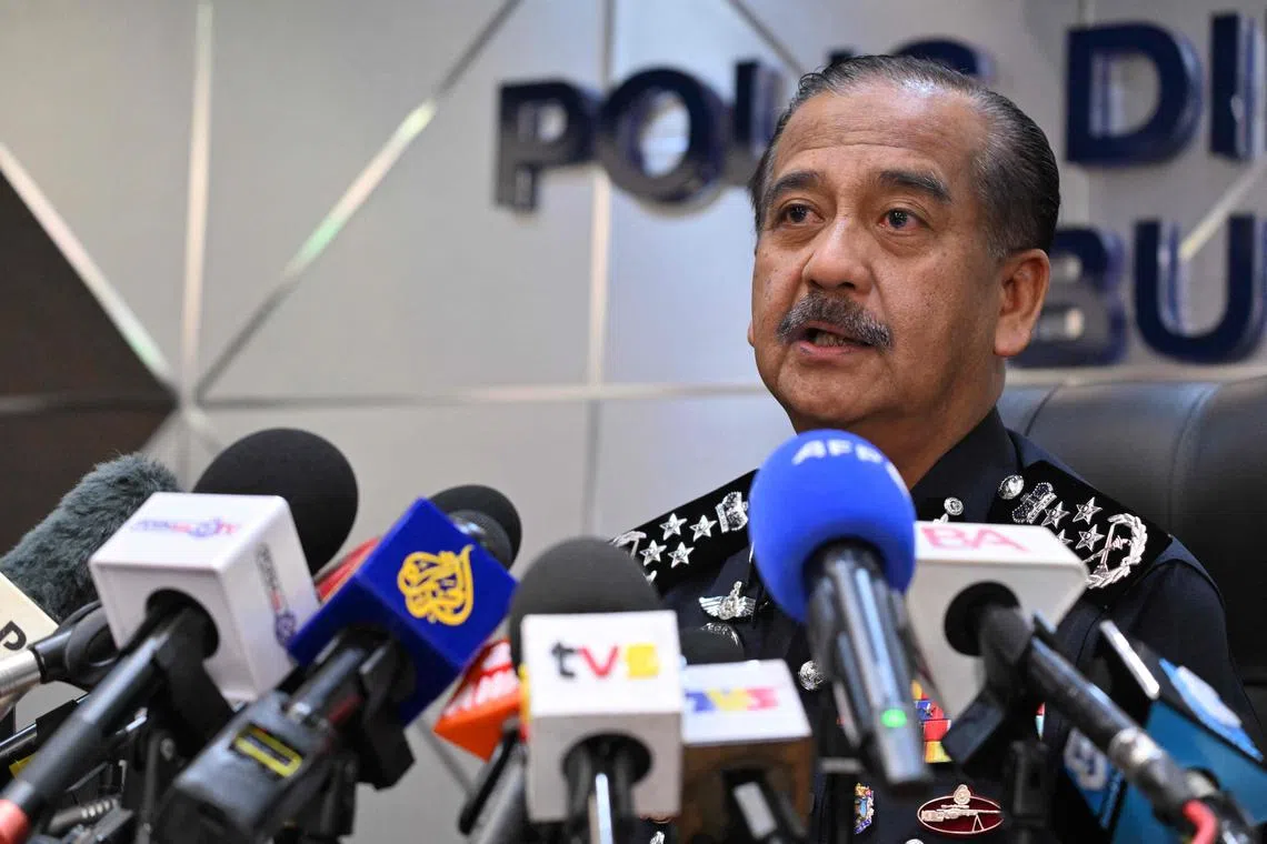 Inspector General of the Royal Malaysia Police Razarudin Husain speaks during a press conference in Kuala Lumpur on April 2, 2024, following the arrest of three locals and a suspected Israeli man who was caught with six handguns. Malaysia does not have diplomatic relations with Israel and does not allow Israeli nationals to enter its territory. (Photo by Mohd RASFAN / AFP)