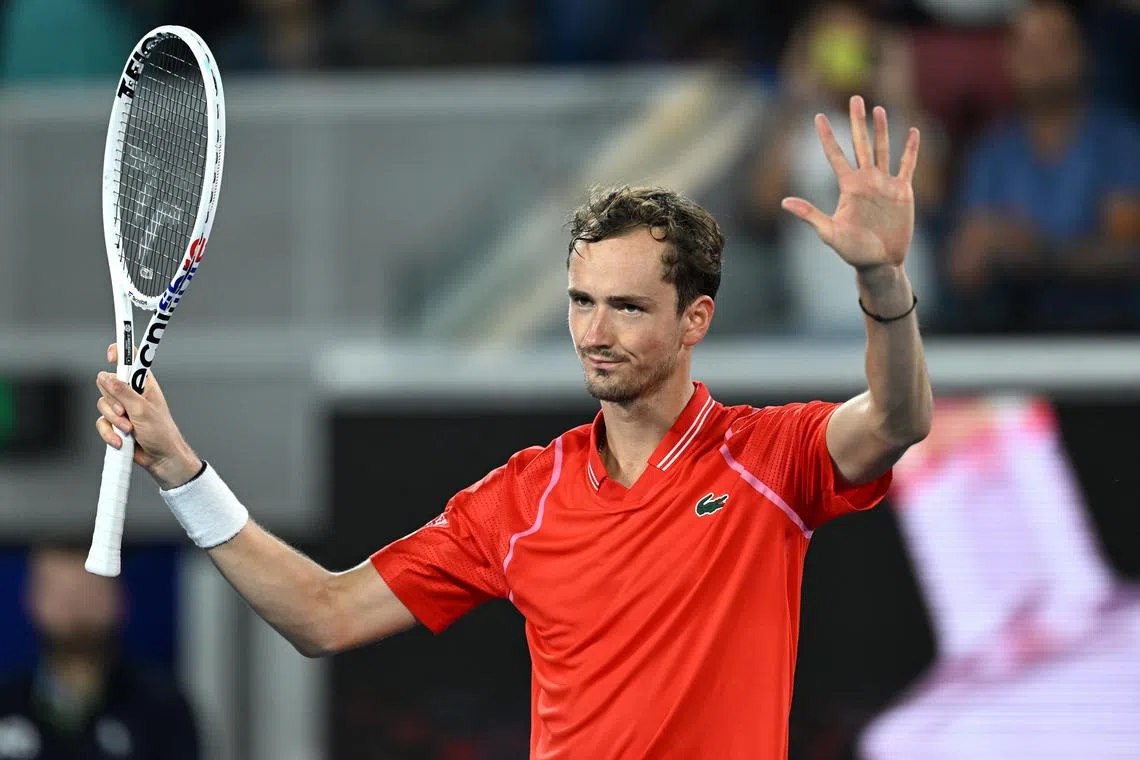 Russia's Daniil Medvedev celebrates after winning his match against John Millman of Australia.