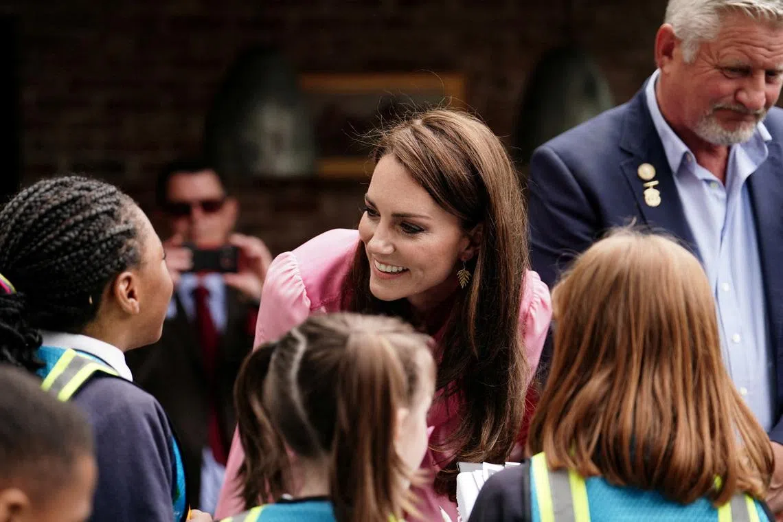 FILE PHOTO: The Princess of Wales speaks to pupils, after taking part in the first Children's Picnic at the RHS Chelsea Flower Show, at the Royal Hospital Chelsea, London, Britain, May 22, 2023. Jordan Pettitt/Pool via REUTERS/File Photo
