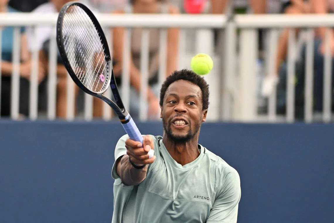 Gael Monfils playing a shot against Christopher Eubanks in the first round of the Canadian Open.