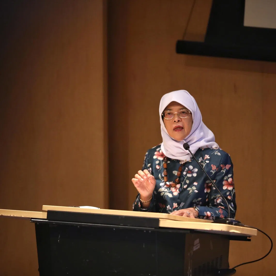 ST20250517_202543600950/sscare17/Taryn Ng/Syarafana Binte Muhammad Shafeeq//

Madam Halimah Yacob, former president of Singapore and Chancellor of Singapore University of Social Sciences speaking at the symposium "Leaving a Living Legacy" hosted by Silver Caregivers Co-op Ltd on May 17, 2025. The event seeks to raise awareness about holistic legacy planning, equip caregivers with essential skills and strategies, and encourage meaningful conversations among family members regarding legacy planning and end-of-life care. ST PHOTO: TARYN NG