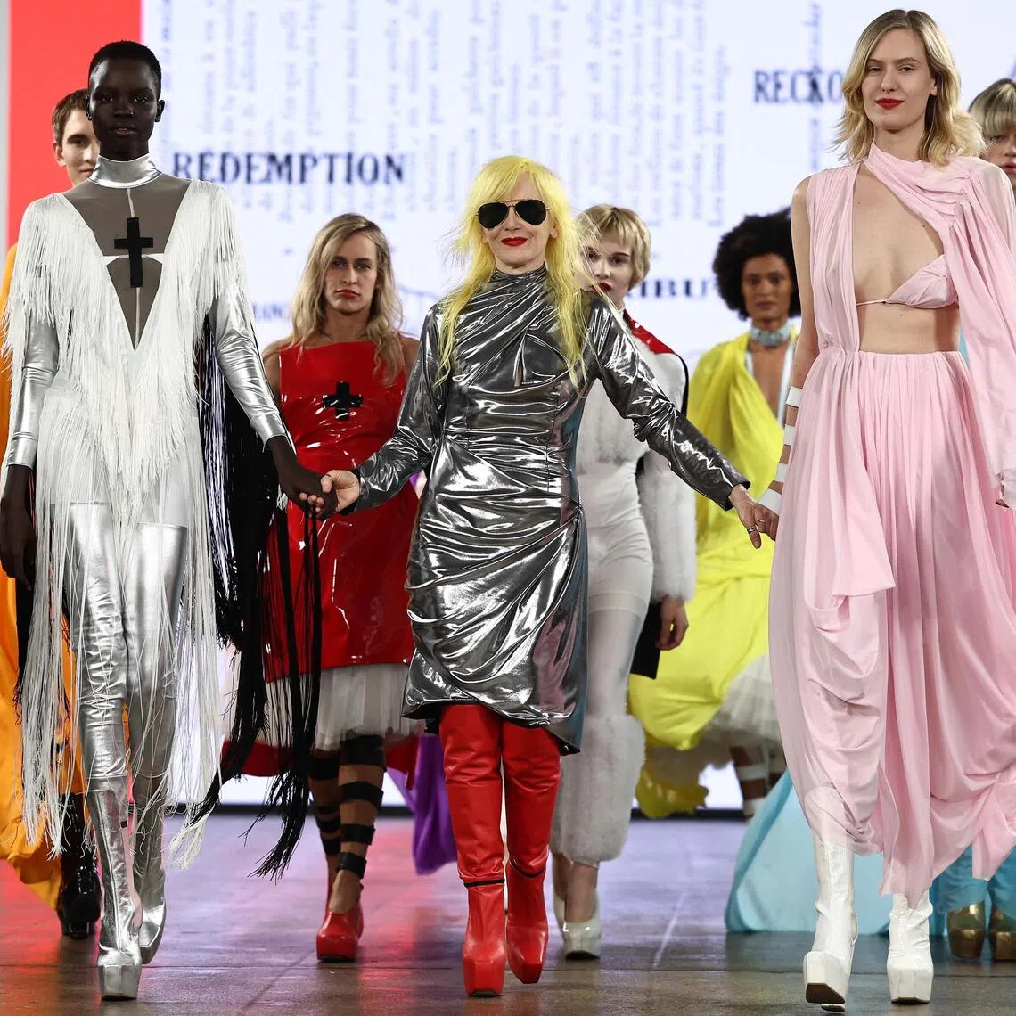 British designer Pam Hogg (centre) after a catwalk presentation for her Spring/Summer 2024 collection at London Fashion Week on Sept 17, 2023. 