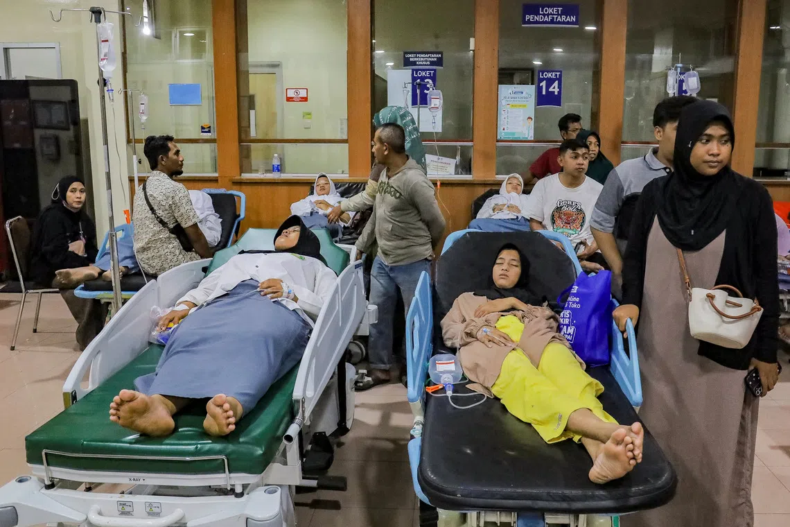 Indonesian officials say government-supplied meals tested after more than 500 students fall ill