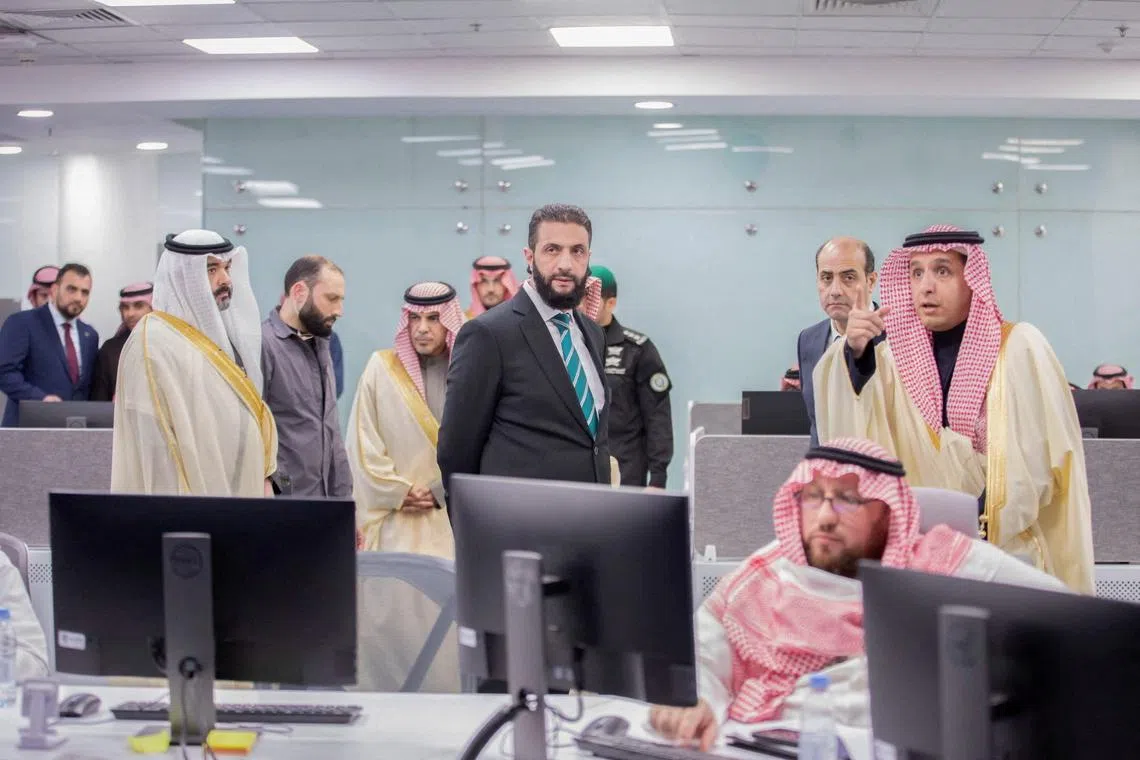 Syria's newly appointed president for a transitional phase Ahmed al-Sharaa visits Saudi Data and AI Authority, in Riyadh, Saudi Arabia, February 2, 2025. Saudi Press Agency/Handout via REUTERS