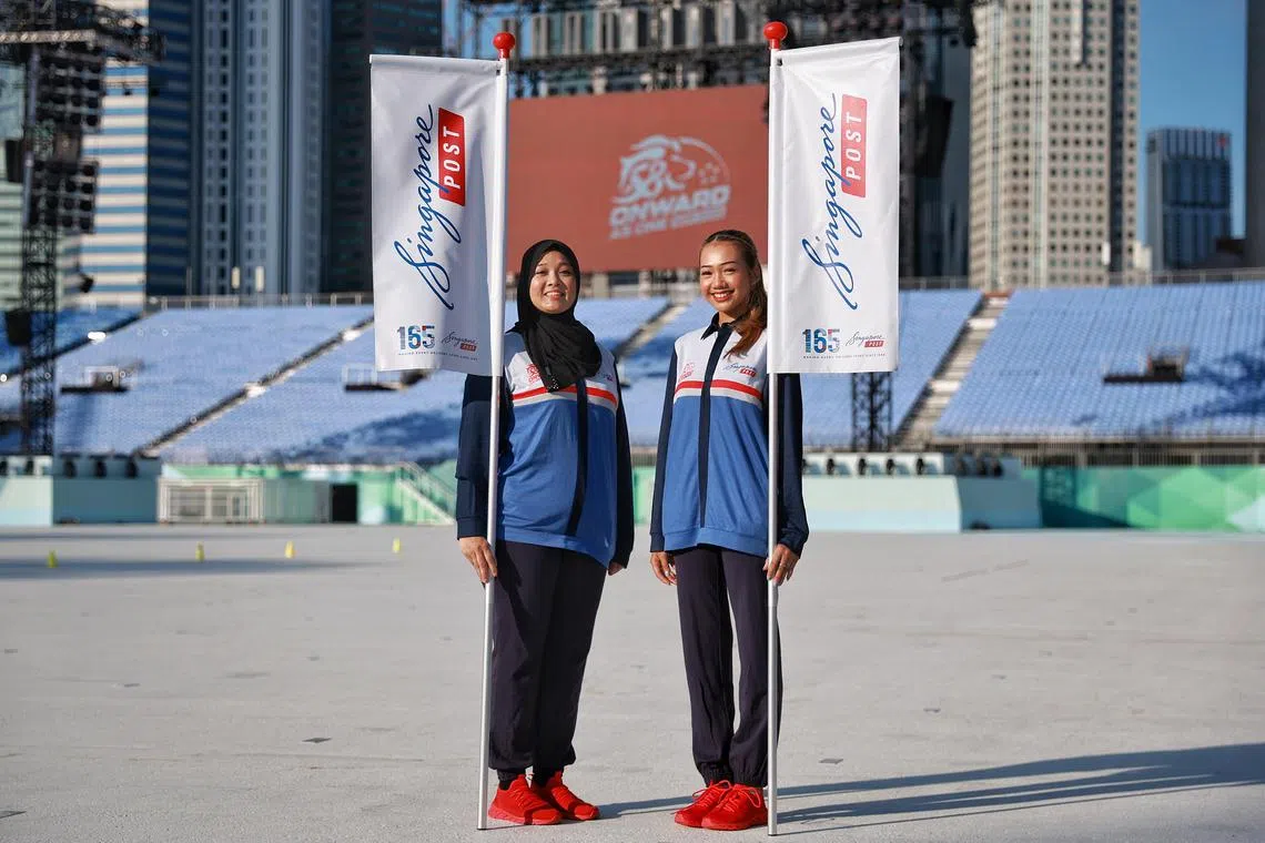 Singapore Post contingent’s Ismadiana Binte Samsuddin (left) and her daughter Nurul Qusyairah Binte Hamzah.