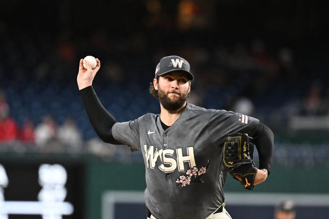 FILE PHOTO: Sep 27, 2024; Washington, District of Columbia, USA;  Washington Nationals pitcher Trevor Williams (32) delivers a first inning pitch against the Philadelphia Phillies at Nationals Park. Mandatory Credit: James A. Pittman-Imagn Images/File photo