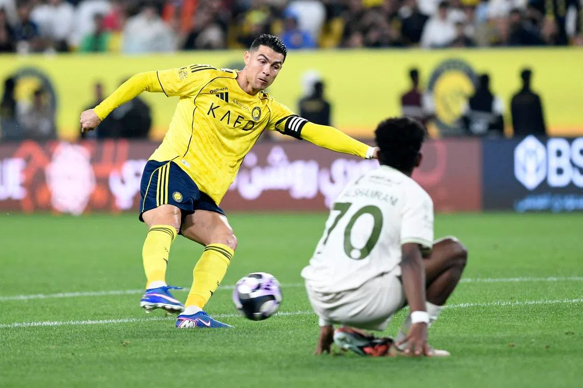 Soccer Football - Saudi Pro League - Al Nassr v Al Hazem - Al Awwal Park, Riyadh, Saudi Arabia - February 21, 2026 Al Nassr's Cristiano Ronaldo shoots at goal REUTERS/Stringer