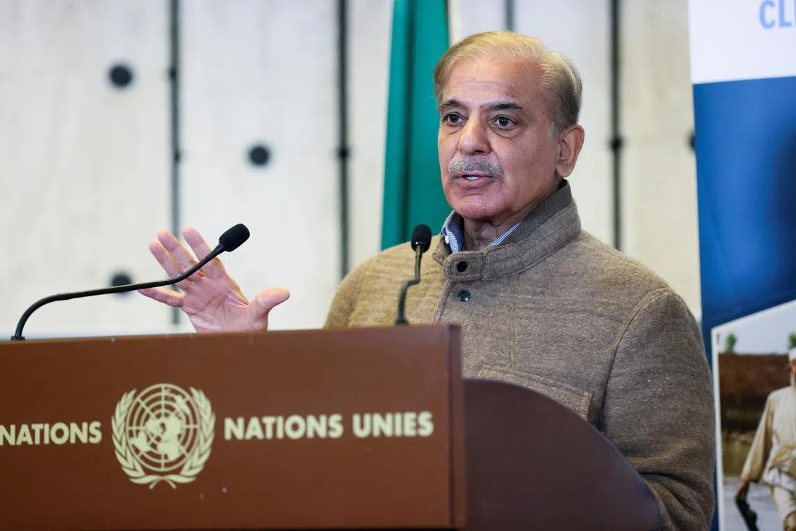 FILE PHOTO: Pakistan's Prime Minister Shehbaz Sharif speaks at a news conference, during a summit on climate resilience in Pakistan, months after deadly floods in the country, at the United Nations, in Geneva, Switzerland, January 9, 2023. REUTERS/Denis Balibouse/File Photo